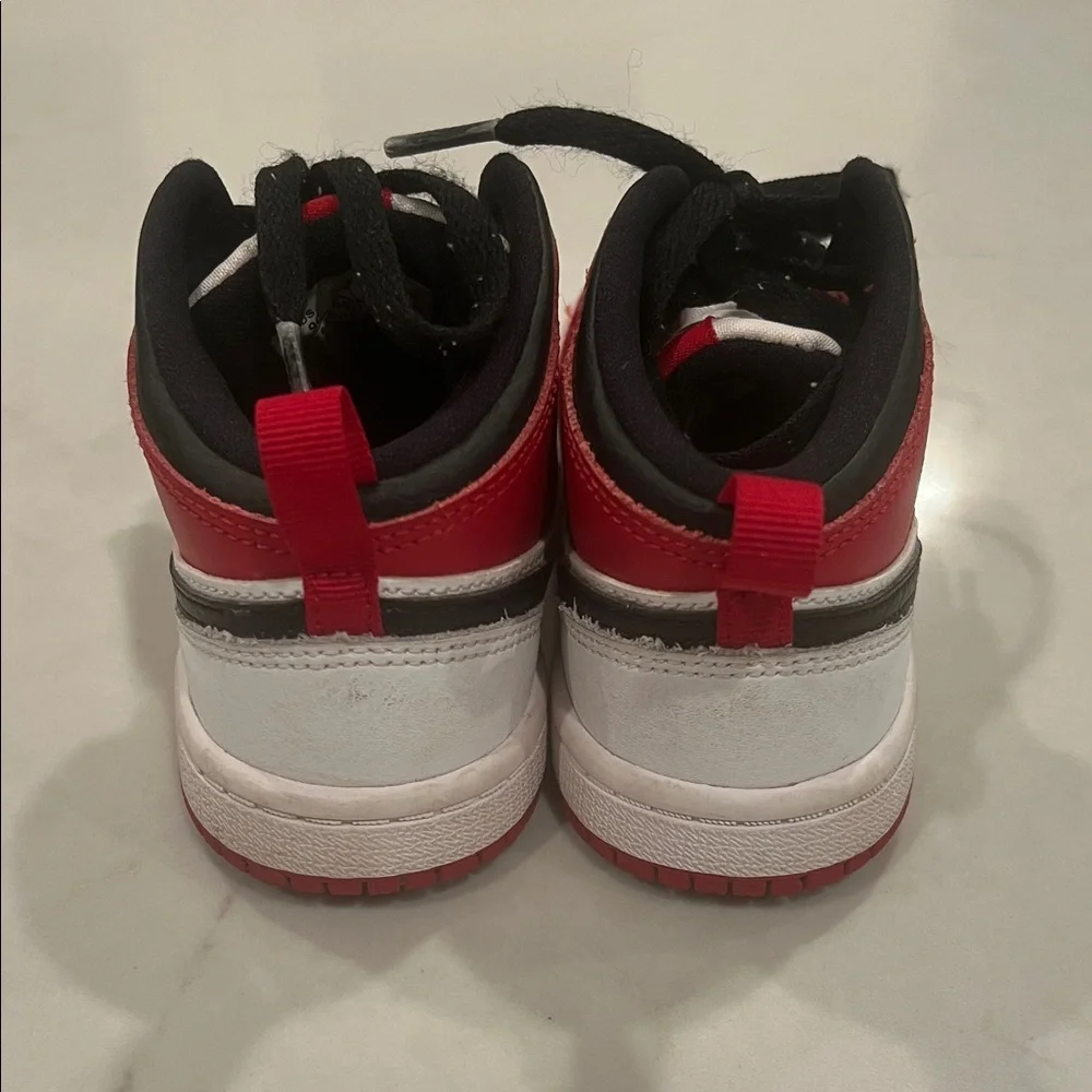 Nike Jordan Kids Red, Black, and White Sneakers